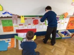 Two of the boys putting the "Líne Eadaigh" and the "Measín Níocháin" to good use.