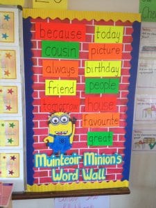The boys are busy learning to spell new words with the help of Múinteoir Minion!